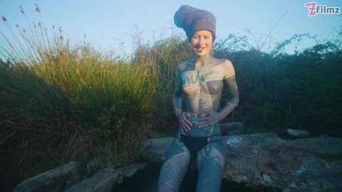 Alternatives enjoying intense outdoor action in a natural hot spring