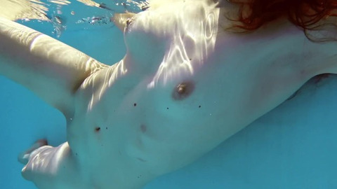 Shy tight virgin trying gymnastics in the pool