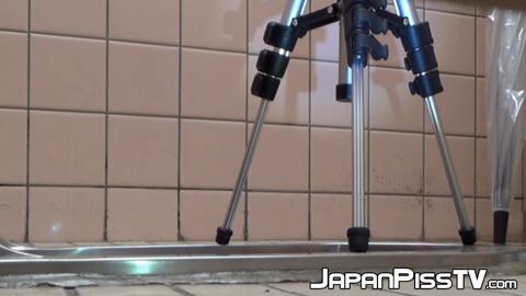 Asian ladies expose during public restroom urination