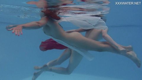 Blonde babes splash in hot tub, skin to skin