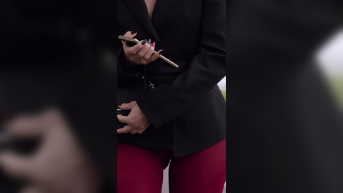 Jeny Smith walks in red leggings walking down the street