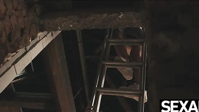 Her big natural tits bounce as she fucks on construction site