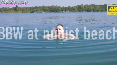 Showing massive tits outside